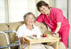 nurse giving patient her food